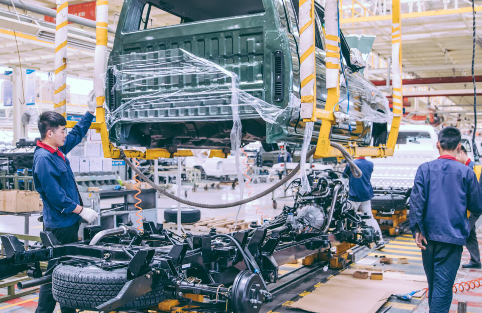 Workers in an automoble factory in Beijing,China.