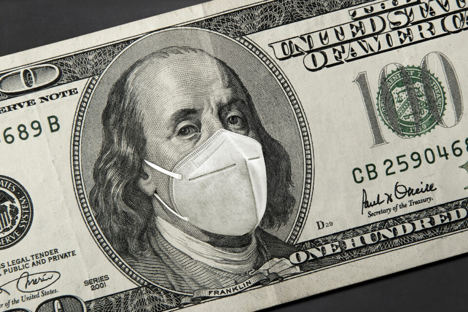 Benjamin Franklin on a $100 bill with a face mask against CoV Corona Virus infection.
