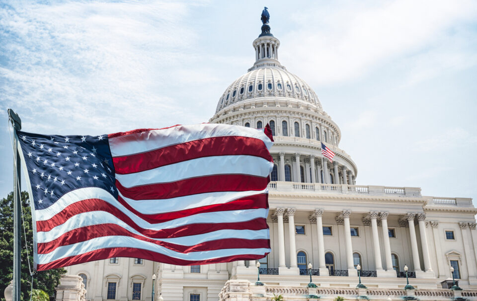 american flag waving for a national holiday in washington dc