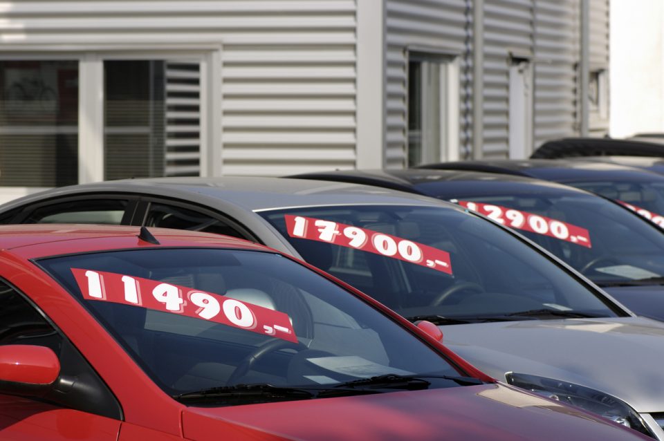 Row of pre-owned cars for sale