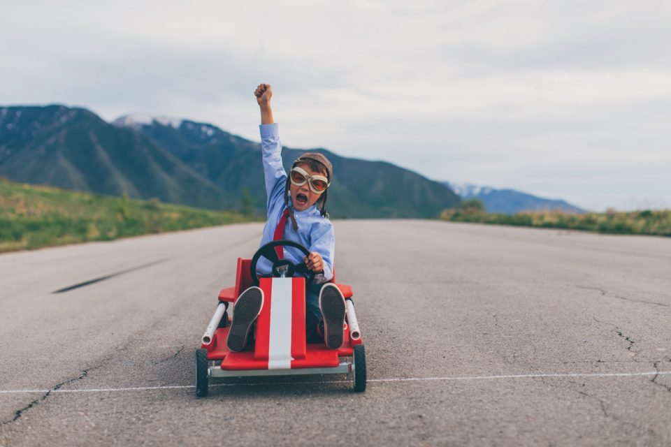 Young Business Boy Wins Go Cart Race